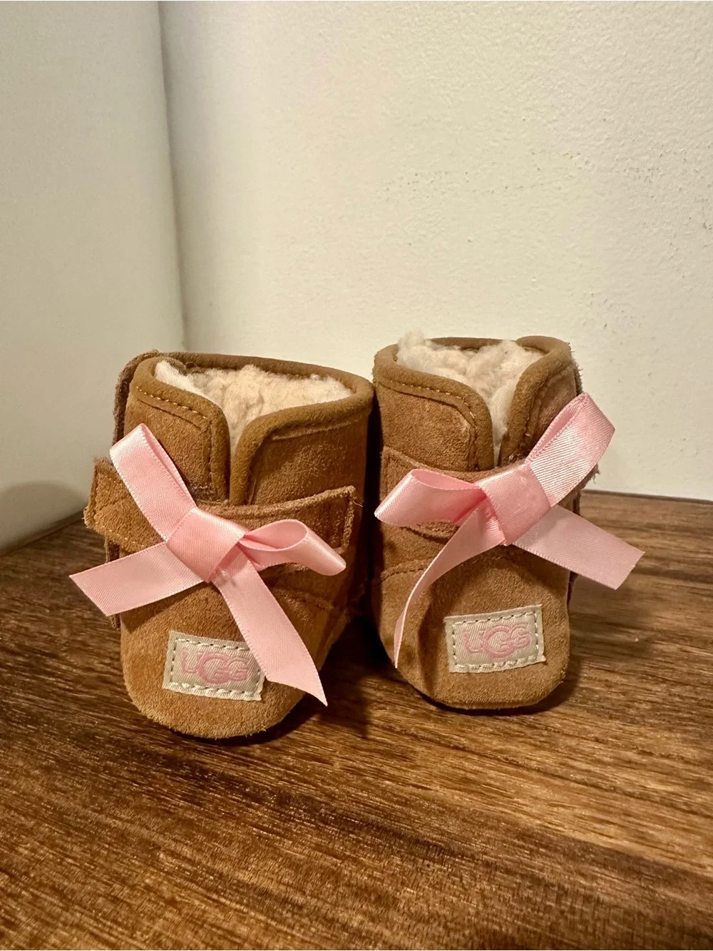 UGG Baby Chestnut Suede Booties with Pink Ribbon Accents, 2-3